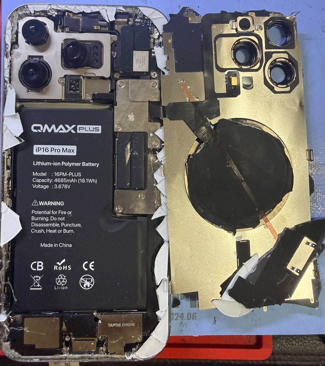 Bad repair job, showing inside of customers iphone with sensors taped down with one thing strand of tape.